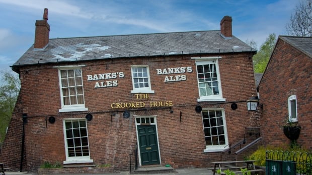 Burned and bulldozed British pub to be rebuilt simply because it was — crooked